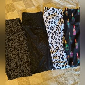 Set of Four Animal Print and Bottle Pattern Leggings